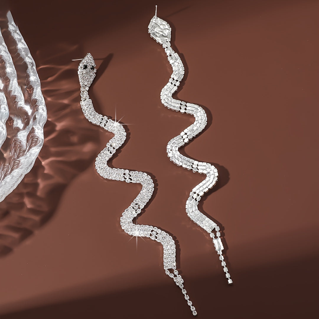The Serpent’s Spell – Rhinestone Tassel Earrings