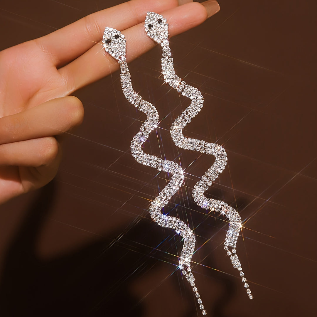 The Serpent’s Spell – Rhinestone Tassel Earrings