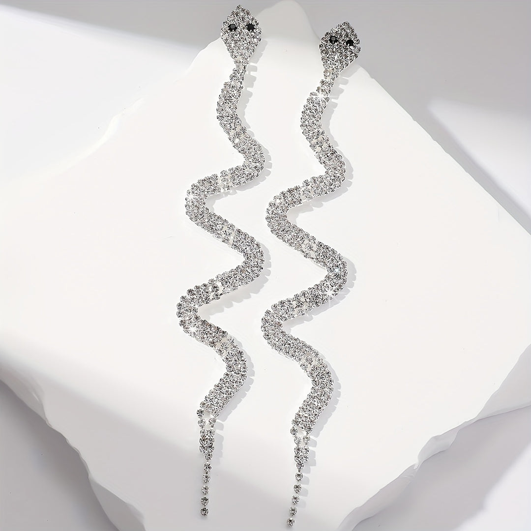 The Serpent’s Spell – Rhinestone Tassel Earrings