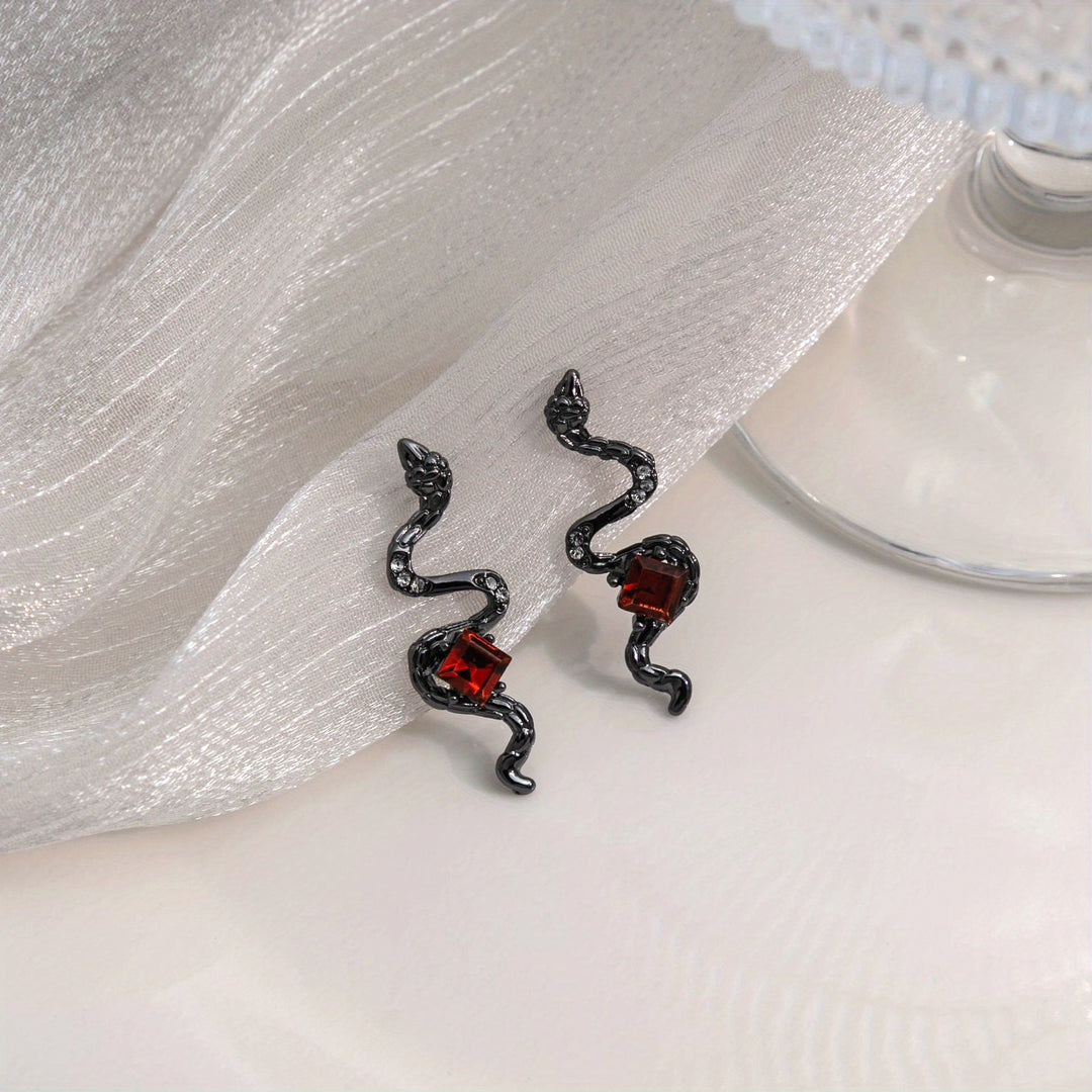 The Siren’s Fang – Red-Eyed Serpent Studs