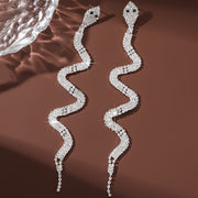 The Serpent’s Spell – Rhinestone Tassel Earrings