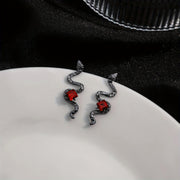 The Siren’s Fang – Red-Eyed Serpent Studs